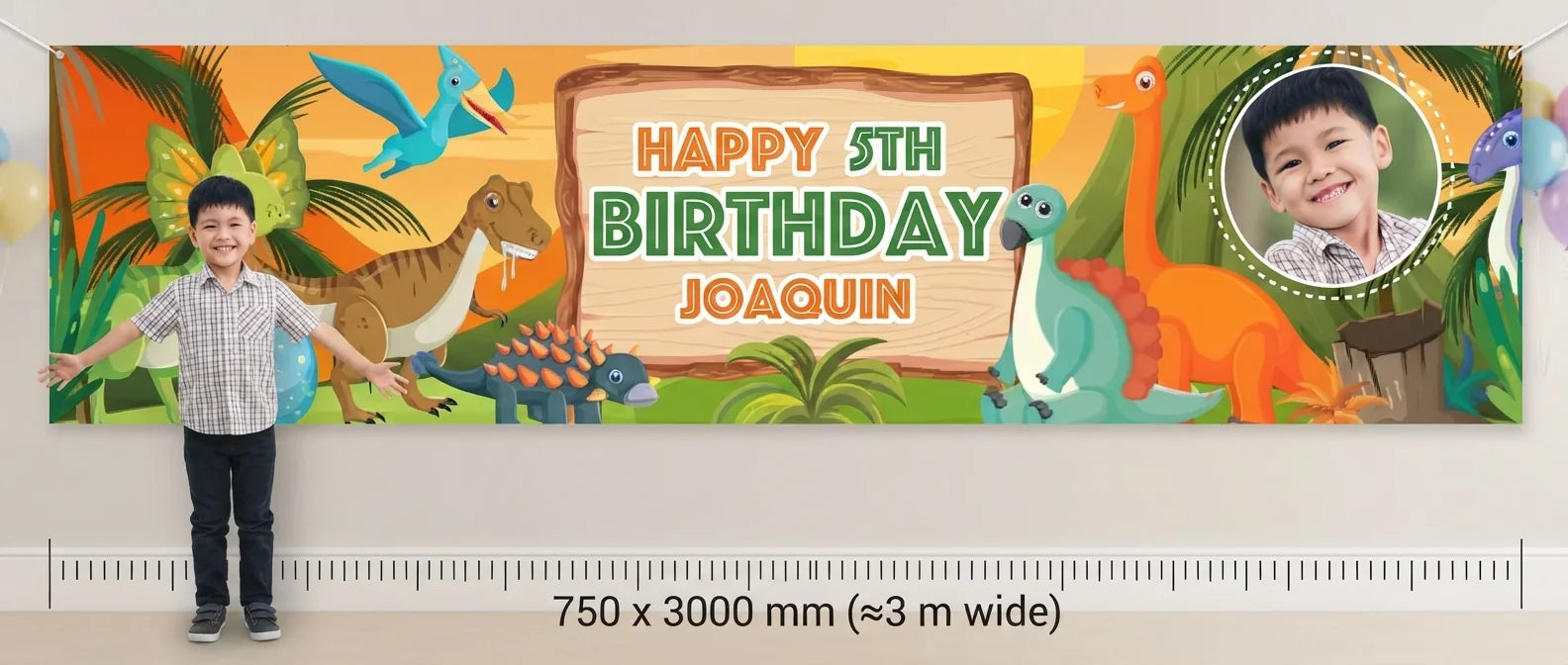 Person standing beside the Dinosaurs Birthday Banner for scale, with size guide showing 750 x 3000 mm