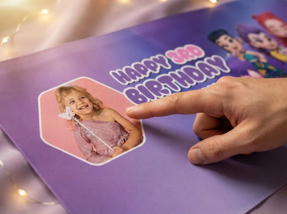 Close-up of the personalised name and photo printed on the KPOP Demon Hunter Heart Birthday Party Banner