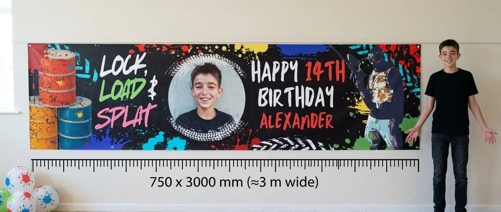 Person standing beside the Lock, Load & Splat Birthday Party Banner for scale, with size guide showing 750 x 3000 mm