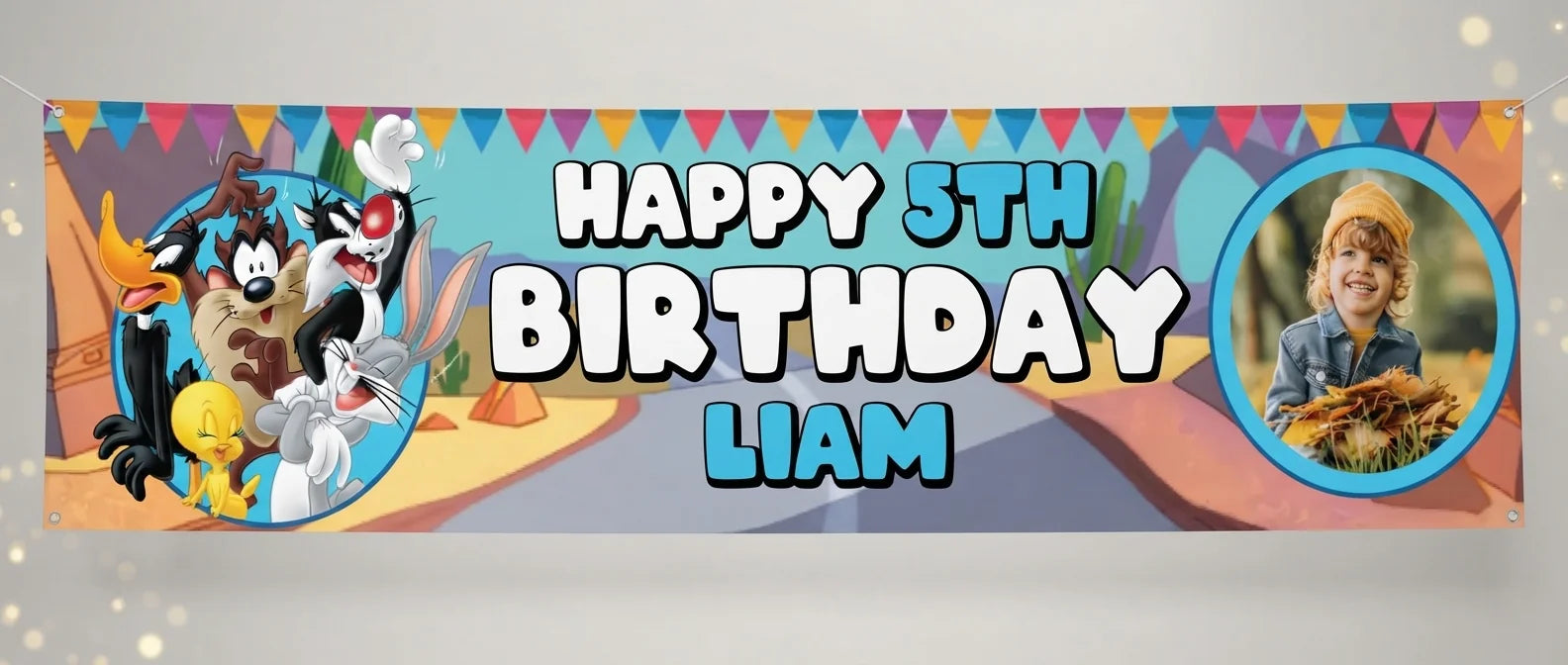 Personalised Looney Tunes Birthday Banner displayed against a plain studio background