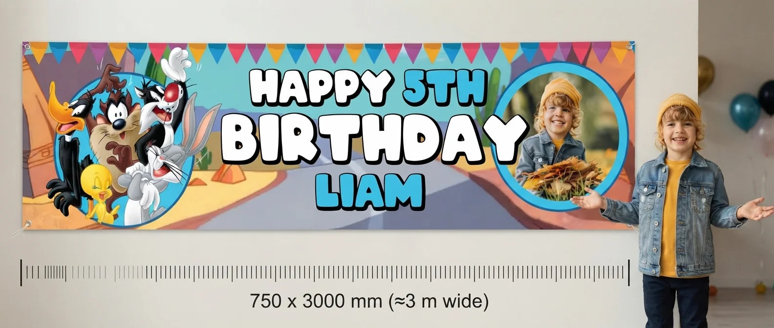 Person standing beside the Looney Tunes Birthday Banner for scale, with size guide showing 750 x 3000 mm