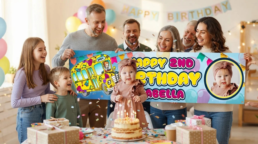 Friends and family celebrating with the personalised Magic School Bus Birthday Banner
