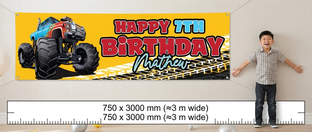 Person standing beside the Monster Truck Birthday Banner for scale, with size guide showing 750 x 3000 mm