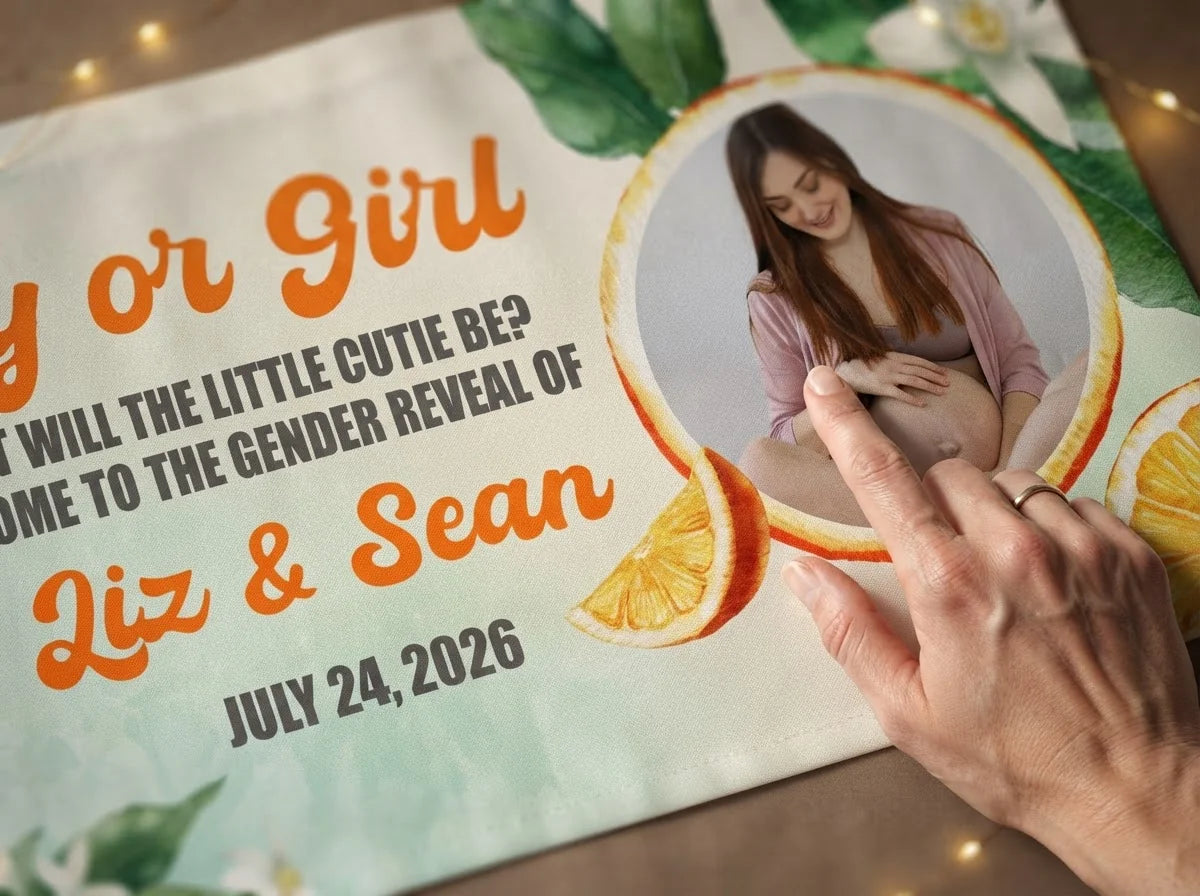 Close-up of the personalised name and photo printed on the Orange Fruit Gender Reveal Party Banner