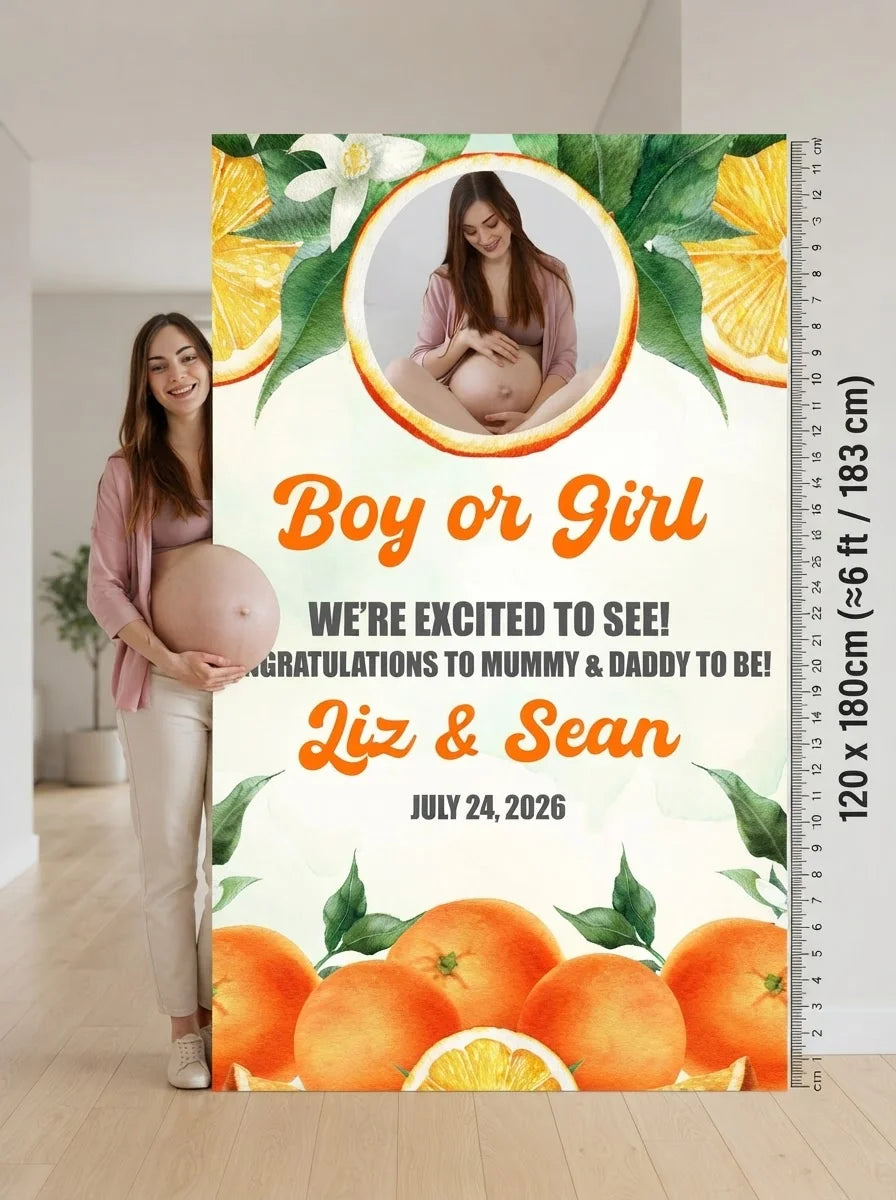 Person standing beside the Orange Fruit Gender Reveal Party Mega Card for scale in a size guide