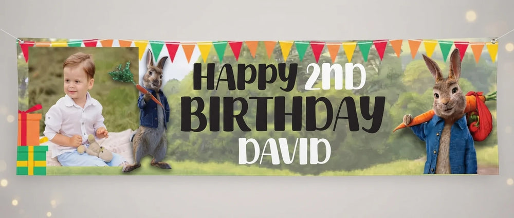 Personalised Peter Rabbit Birthday Banner displayed against a plain studio background