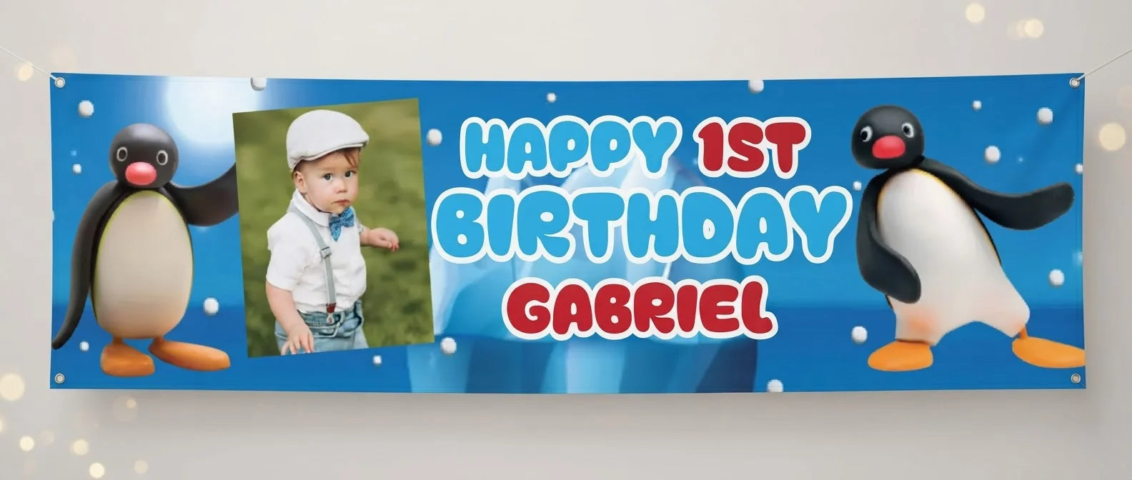 Personalised Pingu Birthday Banner displayed against a plain studio background