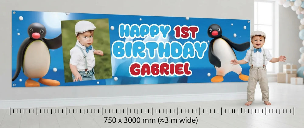 Person standing beside the Pingu Birthday Banner for scale, with size guide showing 750 x 3000 mm