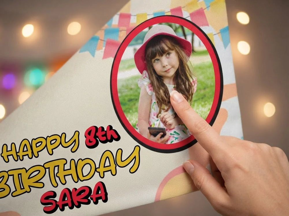 Close-up of the personalised name and photo printed on the Rugrats Birthday Banner