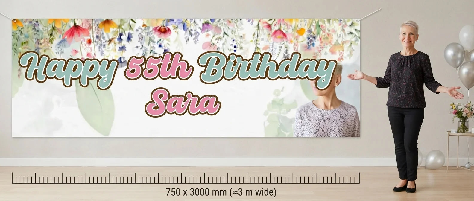 Person standing beside the Summer Flower Birthday Party Banner for scale, with size guide showing 750 x 3000 mm
