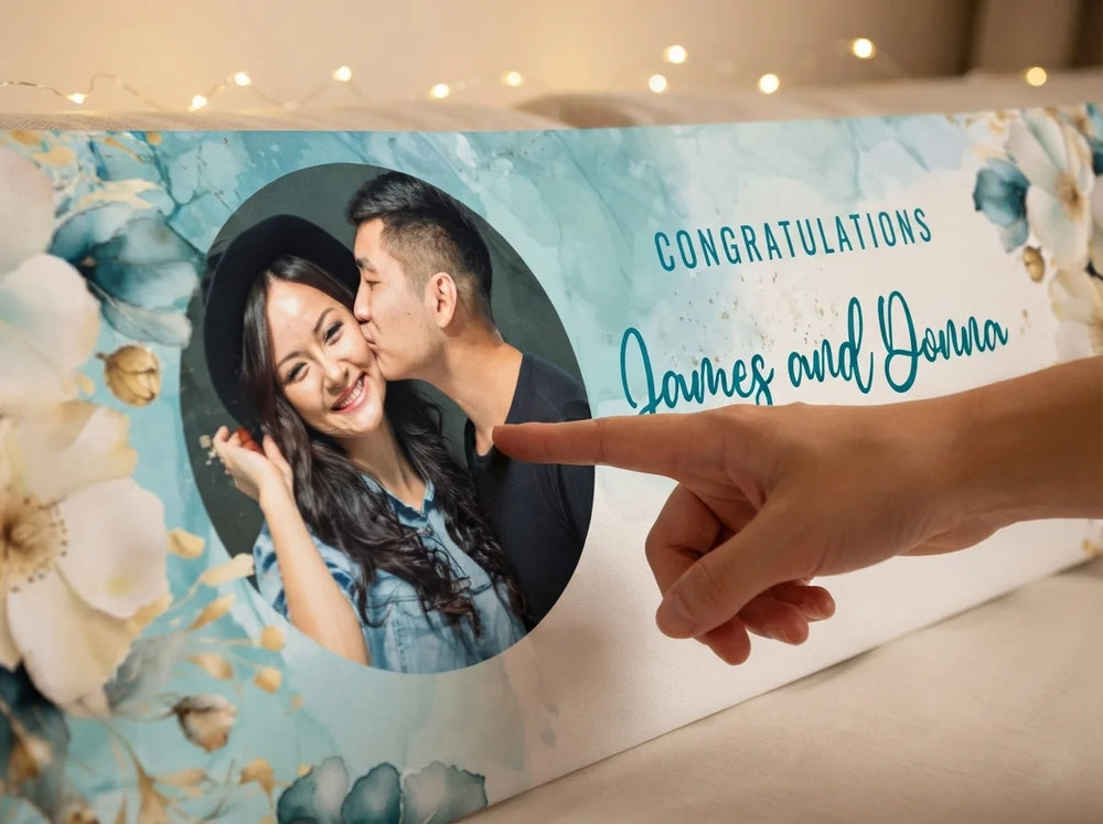 Close-up of the personalised name and photo printed on the Teal and Gold Flower Theme Wedding