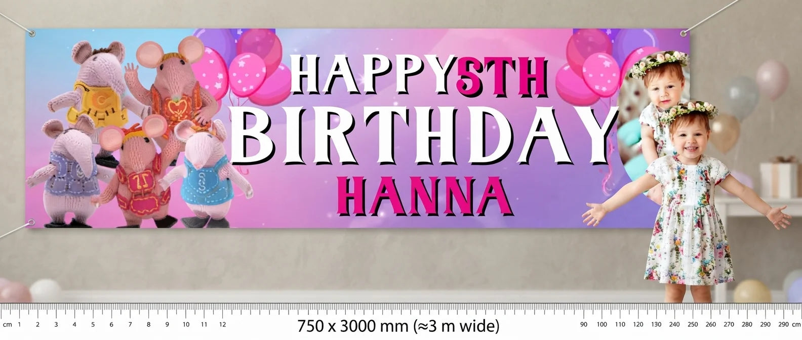 Person standing beside the The Clangers Birthday Banner for scale, with size guide showing 750 x 3000 mm