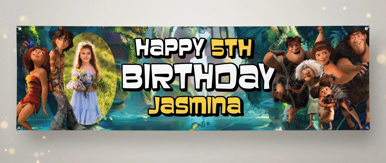 Personalised The Croods Birthday Banner displayed against a plain studio background