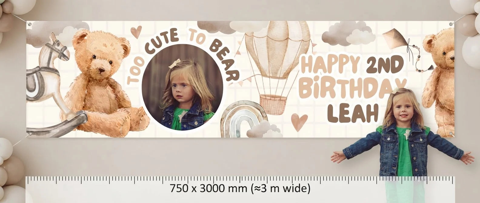 Person standing beside the Too Cute To Bear Birthday Party Banner for scale, with size guide showing 750 x 3000 mm