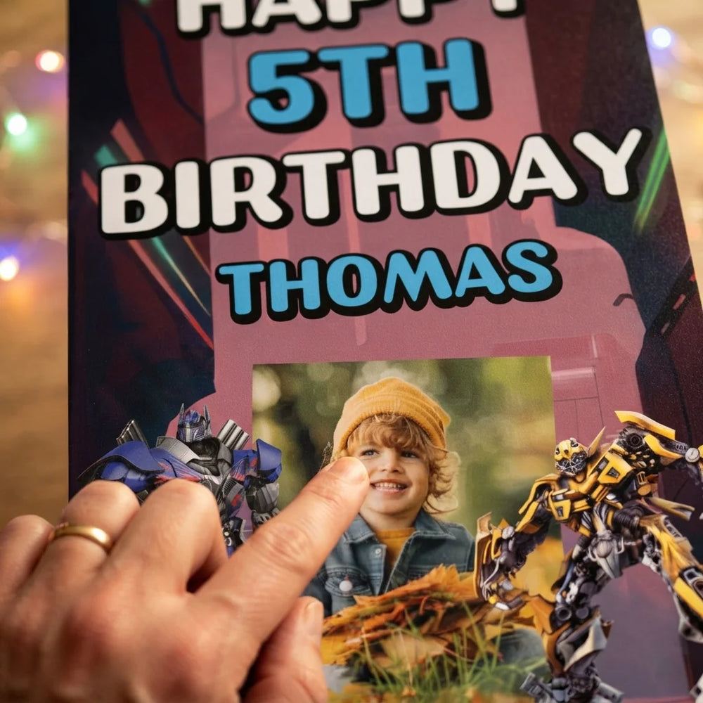 Close-up of the personalised name and photo printed on the Transformers Mega Card
