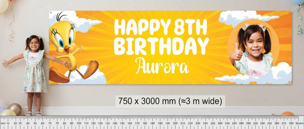 Person standing beside the Tweety Bird Birthday Banner for scale, with size guide showing 750 x 3000 mm
